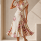 🌺 Soft Floral Print, Flutter Sleeves & Cross-Over Neckline – Pure Femininity. Shop the Valentina!